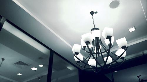 Low angle view of illuminated lamp