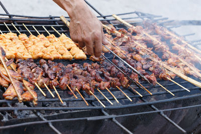 Close-up of meat on barbecue grill