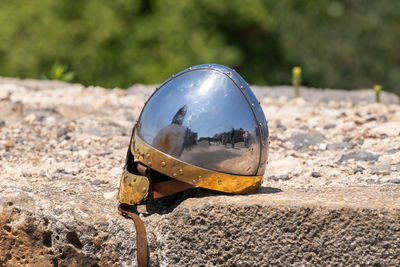 Close-up of crystal ball on field