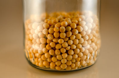 High angle view of eggs in glass container on table