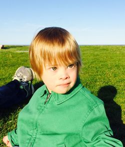 Portrait of boy on field