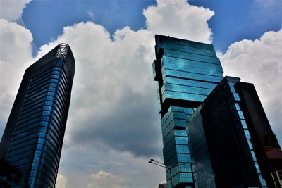 Low angle view of skyscrapers against sky