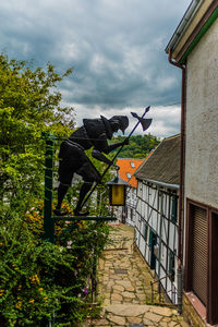 Built structure by building against sky