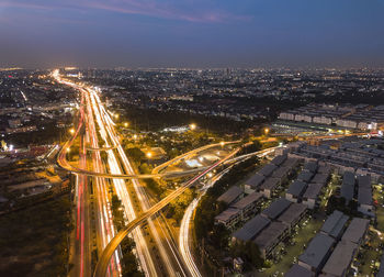 High angle view of illuminated cityscape at night