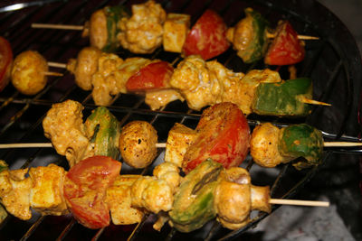 High angle view of vegetables on barbecue grill