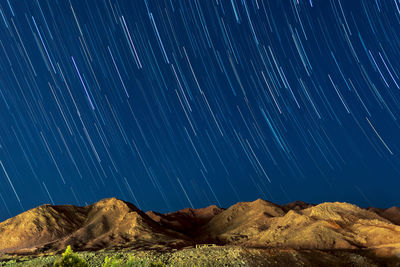 Scenic view of star field against sky at night