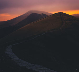 Scenic view of mountains against sky during sunset