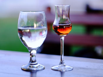 Close-up of schnapps in glass on table