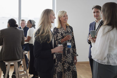 Business people talking during coffee break