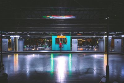 View of illuminated railroad station platform
