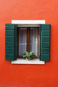 Close-up of window on wall of building