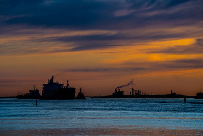 Ships at the port at sunset
