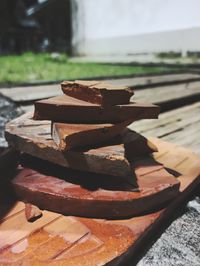 Close-up of rusty stack on table