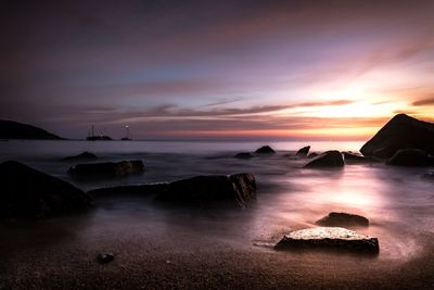 Scenic view of sea against sky during sunset