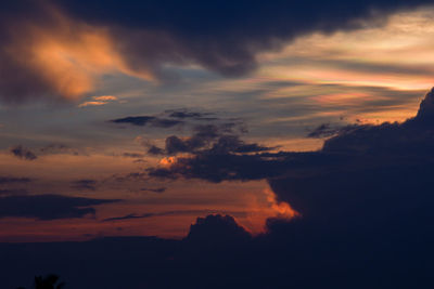 Low angle view of dramatic sky during sunset