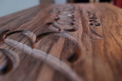 Close-up of rusty metal on table