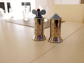 Close-up of bottles on table in restaurant