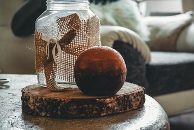 Close-up of ice cream in jar on table