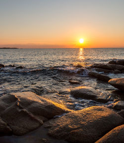 Scenic view of sea against sky during sunset