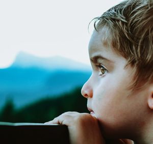 Close-up of boy looking away