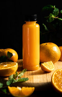 Close-up of oranges on table