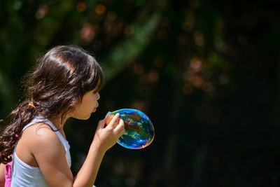 Woman in bubbles