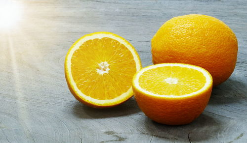 Close-up of orange fruit on table
