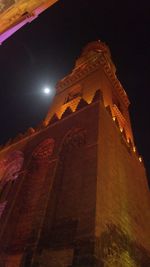 Low angle view of illuminated temple against sky at night