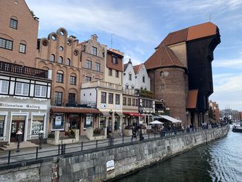 Buildings in city against sky
