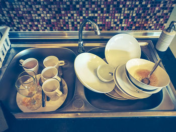 Coffee cups on table in kitchen