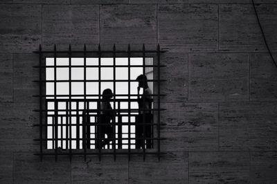 Full length of woman standing in pond