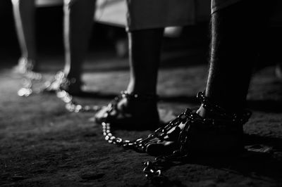 Low section of chained prisoner at prison