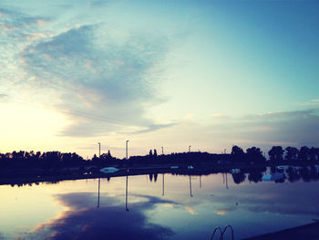 Reflection of clouds in calm lake