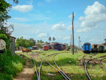 Railroad track against sky