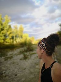 Close-up of mature woman looking at landscape