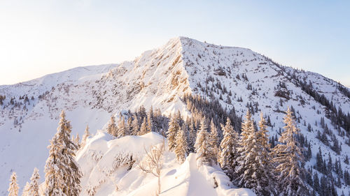 Snow covered mountain against sky