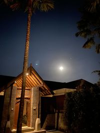 Low angle view of building against sky at night