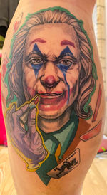 Portrait of man with multi colored face