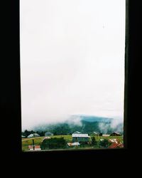 View of city through window