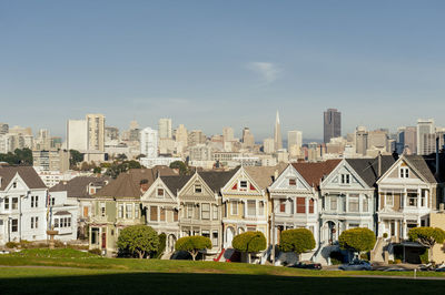 Buildings in city against sky