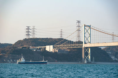 Cargo ship at kanmon bridge