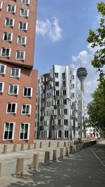 Low angle view of buildings against sky