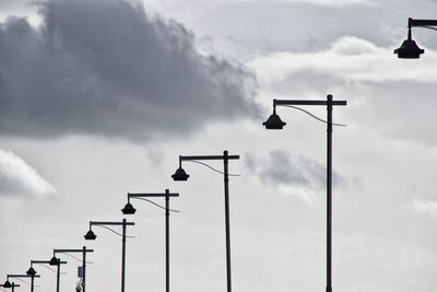 Low angle view of street light against sky