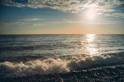 Scenic view of sea against sky during sunset