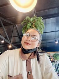 Portrait of woman wearing hat