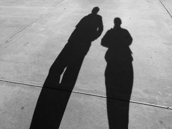 Shadow of people on wall