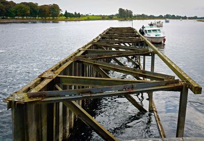 View of pier on calm lake