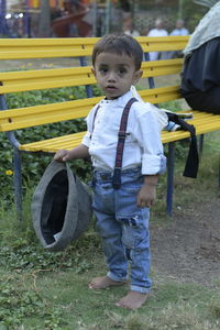 Portrait of boy on field