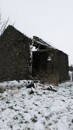 Low angle view of old house