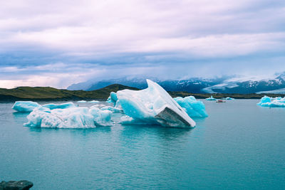 Glacier - scenic view of sea against sky 